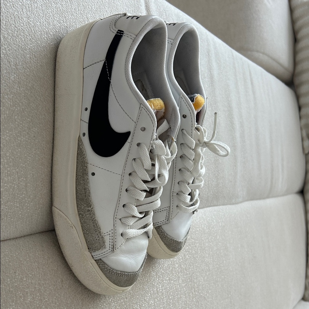 Nike White and Gray Sneakers with Black Swoosh